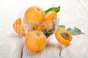 Apricots on a wooden background