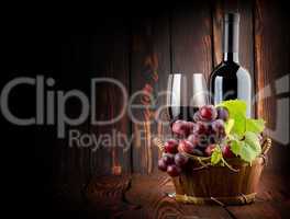 Wine on the old wooden background