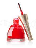 Red nail polish and brush isolated