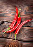 Chili on a wooden background