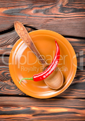 Plate and pepper