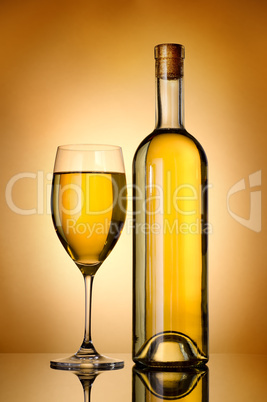 Bottle over gold background