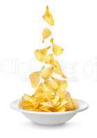 Potato chips falling in the plate