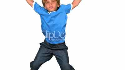 Boy jumping on white background