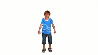 Boy jumping on a white background