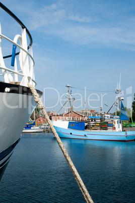 Boats moored in the harbor, island Moen, Denmark