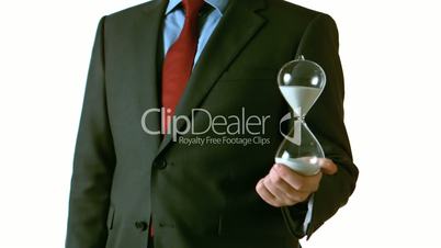 Man holding a hourglass in his hand