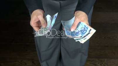 business trousers counting money