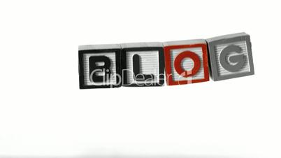 Blog spelled out in letters falling over