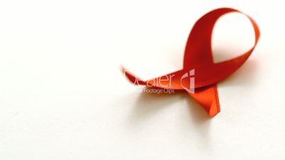 Red ribbon falling over