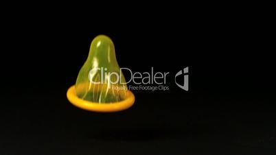 Yellow condom dropping down