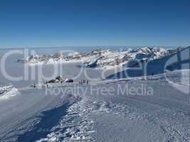 Ski region Titlis, snow covered mountains and sea of fog