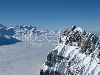 Sea of fog and mountains, view from the Titlis