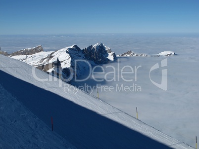 Ski slopes on the Titlis, mountains and sea of fog