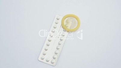 Contraceptive pill with condom