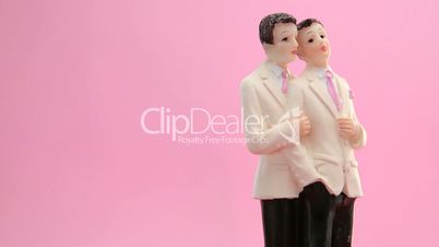 Revolving gay groom cake toppers