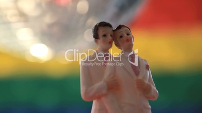 Gay groom cake toppers revolving with disco ball