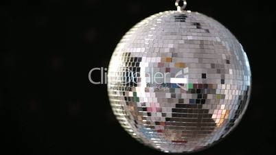 Shiny disco ball revolving