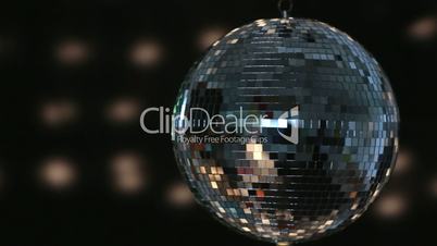 Shiny disco ball spinning around