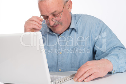 Mature man with laptop