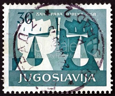 Postage stamp Yugoslavia 1958 White and Black Hands Holding Scal