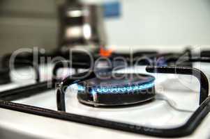 Burning gas oven in kitchen