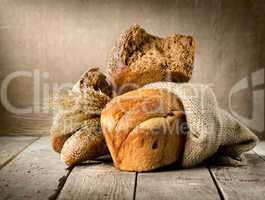 Bread in assortment and wheat
