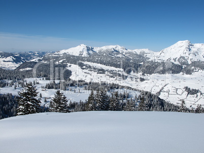 Winter day in the Swiss Alps, snow landscape