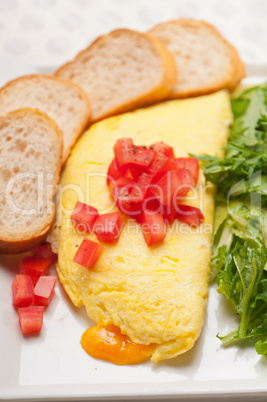 cheese ometette with tomato and salad