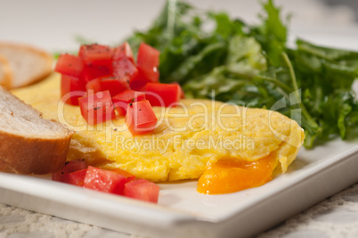 cheese ometette with tomato and salad