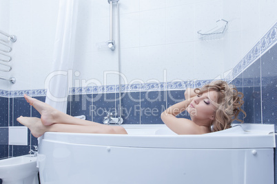 Beauty blonde woman relax in bath