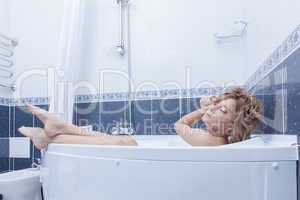 Beauty blonde woman relax in bath