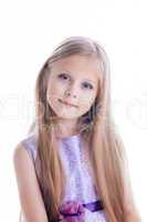 Beautiful blonde little girl in purple dress