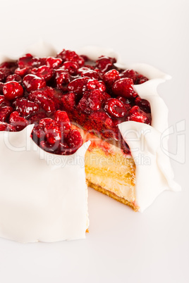 Sugar icing cake with red berries dessert