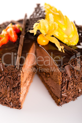 Rich chocolate cake with fruit decoration