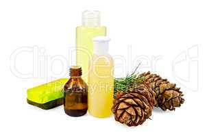 Oil with lotion and cedar cones