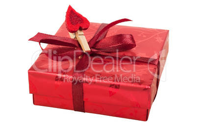 Red gift box with a heart