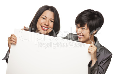 Attractive Mixed Race Mother and Daughter Holding Blank White Si