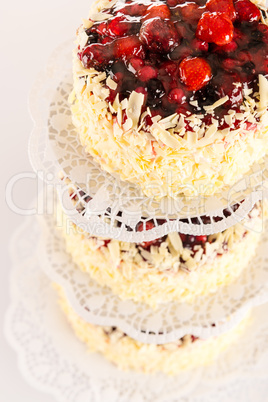 Stacked cake red berries and almonds
