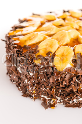 Banana dessert cake with dark chocolate topping