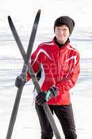 Woman with cross-country skis