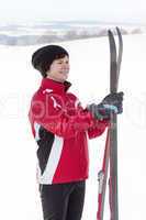 Woman with cross-country skis