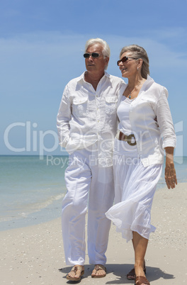Happy Senior Couple Walking by Sea on Tropical Beach