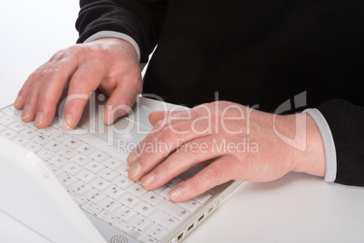 Mature man with laptop