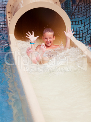 boy on water slide
