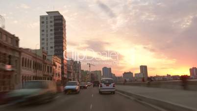 Timelapse of Havana, Cuba at sunset with cars, people, traffic
