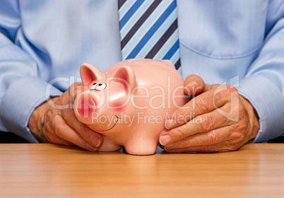 Mann mit Sparschwein - Savings Pig