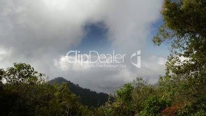 Floating clouds in the mountains of Park Montecristo in El Salvador Time Lapse II