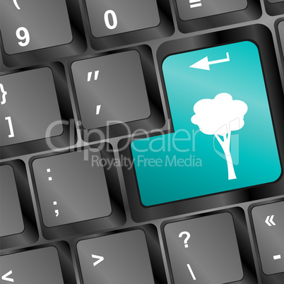 Computer keyboard with abstract tree key - holiday concept