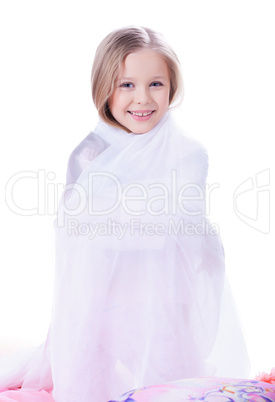 Pretty little girl with blanket